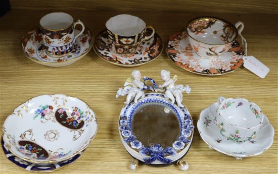 A Dresden floral encrusted cup and saucer, a quantity of Royal Crown Derby teaware and a Sitzendorf wall mirror